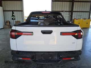 2024 Hyundai Santa Cruz SEL z VIN 5NTJBDDE7RH108838, wystawiony jako Copart lot #80703594 z przebiegiem 11 524 mil mil oraz Czysty tytuł • Clean title. Historia ofert i sprzedaży dostępna na DreamBid. Obrazek 6.