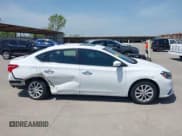 ✅ 2017 Nissan Sentra SL • VIN: 3N1AB7AP3HY348415 • Lot: 42027013. Listed on IAAI with 125,884 mi. Free auction sales archive from the USA and detailed vehicle history report at DreamBid. Image 13.
