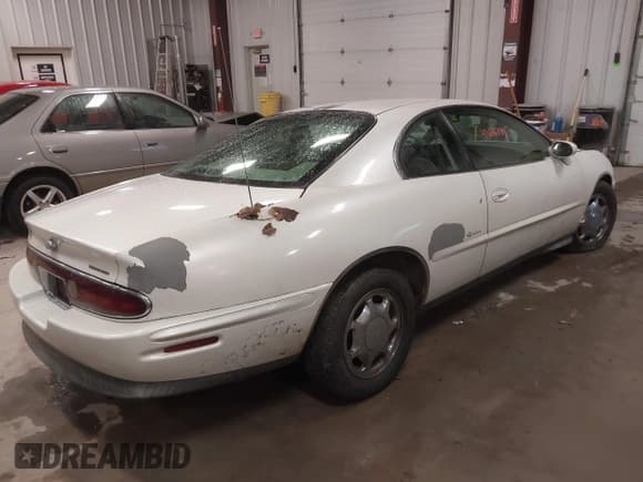 ✅ 1997 Buick Riviera • VIN: 1G4GD2218V4715463 • Lot: 43681744. Listed on IAAI with 183,061 mi. Free auction sales archive from the USA and detailed vehicle history report at DreamBid. Image 4.