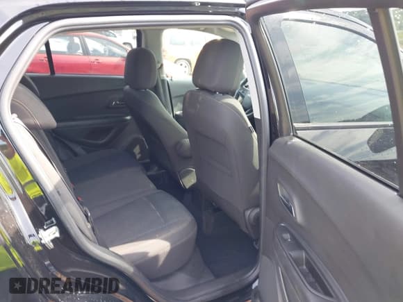 ✅ 2022 Chevrolet Trax LS • VIN: KL7CJNSM5NB542114 • Lot: 42705038. Listed on IAAI with 77,668 mi. Free auction sales archive from the USA and detailed vehicle history report at DreamBid. Image 8.