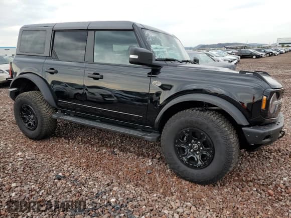 ✅ 2024 Ford Bronco Wildtrak • VIN: 1FMEE2BP8RLA25197 • Lot: 82352365. Listed on Copart with 26,939 mi. Free auction sales archive from the USA and detailed vehicle history report at DreamBid. Image 4.