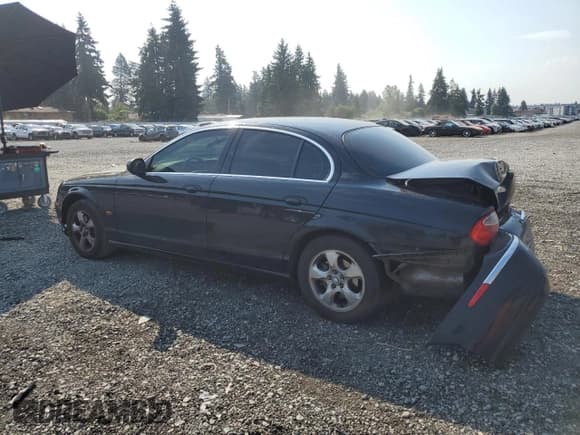 ✅ 2003 Jaguar S-Type • VIN: SAJEB01TX3FM64246 • Lot: 69216745. Listed on Copart with 205,524 mi. Free auction sales archive from the USA and detailed vehicle history report at DreamBid. Image 2.