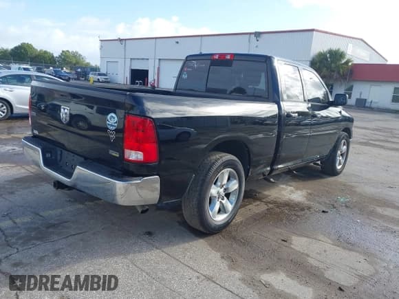 ✅ 2015 Ram 1500 SLT • VIN: 1C6RR6GG4FS529751 • Lot: 43349323. Listed on IAAI with 163,123 mi. Free auction sales archive from the USA and detailed vehicle history report at DreamBid. Image 4.