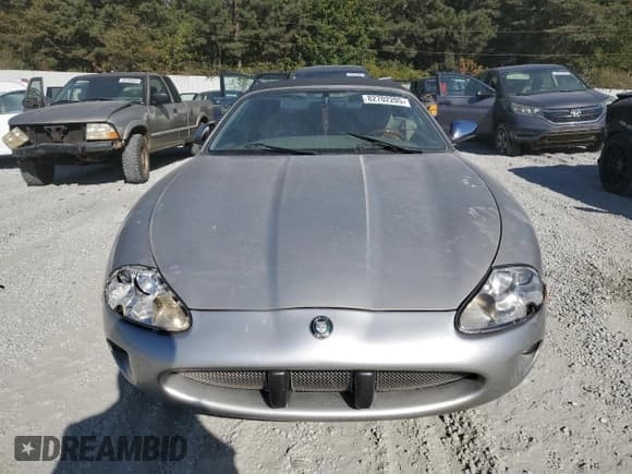 ✅ 1999 Jaguar XK • VIN: SAJGX2041XC040090 • Lot: 82702205. Listed on Copart with Not provided. Free auction sales archive from the USA and detailed vehicle history report at DreamBid. Image 5.