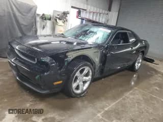 ✅ 2013 Dodge Challenger SXT • VIN: 2C3CDYAG9DH520005 • Lot: 77024504. Wystawiony na Copart z przebiegiem 48 802 mil. Bezpłatny archiwum sprzedaży aukcyjnych z USA i szczegółowy raport historii pojazdu na DreamBid. Zdjęcie 1.