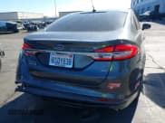 ✅ 2017 Ford Fusion SE • VIN: 3FA6P0PU9HR329389 • Lot: 43661629. Listed on IAAI with 84,761 mi. Free auction sales archive from the USA and detailed vehicle history report at DreamBid. Image 16.