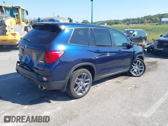 ✅ 2023 Honda Passport EX-L • VIN: 5FNYF8H57PB017891 • Lot: 43327862. Listed on IAAI with 61,839 mi. Free auction sales archive from the USA and detailed vehicle history report at DreamBid. Image 4.