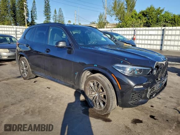 ✅ 2019 BMW X5 xDrive50i • VIN: 5UXJU2C52KLN66897 • Lot: 95786095. Wystawiony na Copart z przebiegiem 90 242 mil. Bezpłatny archiwum sprzedaży aukcyjnych z USA i szczegółowy raport historii pojazdu na DreamBid. Zdjęcie 4.