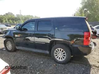 2012 Chevrolet Tahoe с VIN 1GNSKDEJ8CR301439, выставлен на аукционе Copart как лот 85297705 с пробегом 169 096 миль миль и Списание • Salvage title. История ставок и продаж доступна на DreamBid. Изображение 2.