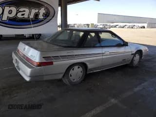 ✅ 1989 Subaru XT • VIN: JF1AX7320KD309697 • Лот: 63270595. Опубликован ранее на Copart с пробегом 114 546 миль. Бесплатный доступ к архиву аукционных продаж из США и подробный отчёт об истории автомобиля на DreamBid. Изображение 3.