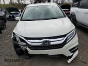 ✅ 2018 Honda Odyssey Elite • VIN: 5FNRL6H92JB028423 • Лот: 54118045. Опубликован ранее на Copart с пробегом 70 026 миль. Бесплатный доступ к архиву аукционных продаж из США и подробный отчёт об истории автомобиля на DreamBid. Изображение 5.