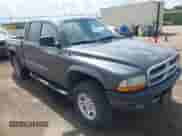 2004 Dodge Dakota Sport z VIN 1D7HG38N44S599565, wystawiony jako IAAI lot #43099721 z przebiegiem 177 658 mil mil oraz . Historia ofert i sprzedaży dostępna na DreamBid. Obrazek 1.