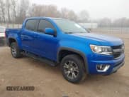 ✅ 2020 Chevrolet Colorado 4WD Z71 • VIN: 1GCGTDEN9L1201976 • Lot: 43696992. Listed on IAAI with 81,315 mi. Free auction sales archive from the USA and detailed vehicle history report at DreamBid. Image 1.