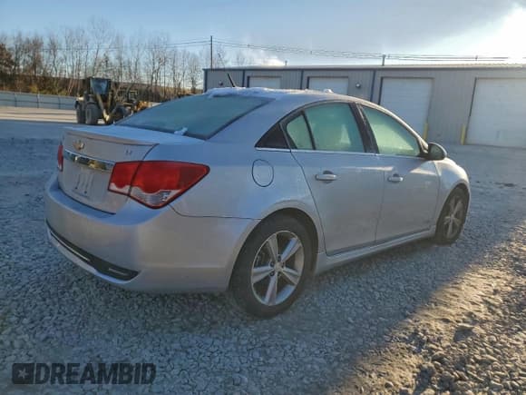 ✅ 2014 Chevrolet Cruze 2LT • VIN: 1G1PE5SB1E7354256 • Лот: 95782925. Опубликован ранее на Copart с пробегом 130 097 миль. Бесплатный доступ к архиву аукционных продаж из США и подробный отчёт об истории автомобиля на DreamBid. Изображение 3.