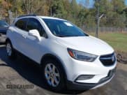 ✅ 2017 Buick Encore Essence • VIN: KL4CJCSB3HB046877 • Lot: 43483880. Listed on IAAI with 130,561 mi. Free auction sales archive from the USA and detailed vehicle history report at DreamBid. Image 1.