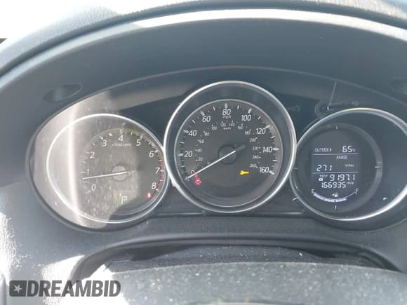 ✅ 2016 Mazda CX-5 Grand Touring • VIN: JM3KE2DY5G0715623 • Lot: 43582561. Wystawiony na IAAI z przebiegiem 166 935 mil. Bezpłatny archiwum sprzedaży aukcyjnych z USA i szczegółowy raport historii pojazdu na DreamBid. Zdjęcie 7.