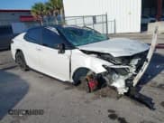 ✅ 2022 Toyota Camry TRD • VIN: 4T1KZ1AK3NU068132 • Lot: 41997486. Listed on IAAI with 23,437 mi. Free auction sales archive from the USA and detailed vehicle history report at DreamBid. Image 1.