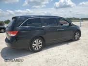 ✅ 2014 Honda Odyssey EX-L • VIN: 5FNRL5H64EB104570 • Lot: 56382095. Listed on Copart with 172,706 mi. Free auction sales archive from the USA and detailed vehicle history report at DreamBid. Image 3.