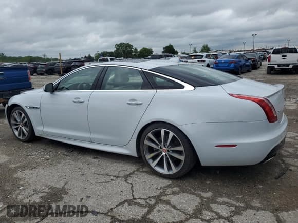 ✅ 2016 Jaguar XJ R-Sport • VIN: SAJWJ1CD1G8W01152 • Lot: 57673925. Listed on Copart with 23,950 mi. Free auction sales archive from the USA and detailed vehicle history report at DreamBid. Image 2.