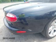 ✅ 2003 Jaguar XK • VIN: SAJDA42C732A35547 • Lot: 42090286. Listed on IAAI with 65,840 mi. Free auction sales archive from the USA and detailed vehicle history report at DreamBid. Image 6.