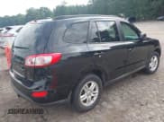 ✅ 2012 Hyundai Santa Fe GLS • VIN: 5XYZGDAG2CG144556 • Lot: 42596221. Listed on IAAI with 164,813 mi. Free auction sales archive from the USA and detailed vehicle history report at DreamBid. Image 4.