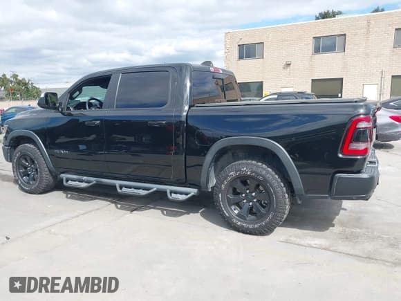 ✅ 2021 Ram 1500 Rebel • VIN: 1C6SRFLTXMN574032 • Lot: 43409254. Wystawiony na IAAI z przebiegiem 34 480 mil. Bezpłatny archiwum sprzedaży aukcyjnych z USA i szczegółowy raport historii pojazdu na DreamBid. Zdjęcie 15.