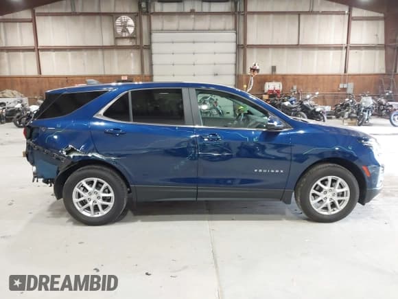 ✅ 2023 Chevrolet Equinox LT • VIN: 3GNAXUEG5PL104436 • Lot: 43215747. Listed on IAAI with 10,059 mi. Free auction sales archive from the USA and detailed vehicle history report at DreamBid. Image 14.