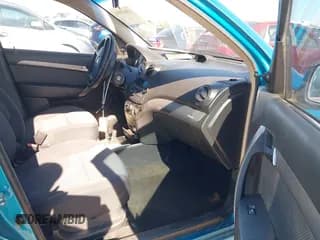 ✅ 2009 Chevrolet Aveo 1LT • VIN: KL1TD56E39B645672 • Lot: 42062896. Wystawiony na IAAI z przebiegiem 131 927 mil. Bezpłatny archiwum sprzedaży aukcyjnych z USA i szczegółowy raport historii pojazdu na DreamBid. Zdjęcie 5.