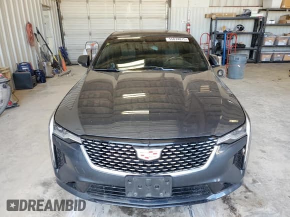 ✅ 2022 Cadillac CT4 Luxury • VIN: 1G6DJ5RK3N0113628 • Лот: 55824815. Опубликован ранее на Copart с пробегом 33 425 миль. Бесплатный доступ к архиву аукционных продаж из США и подробный отчёт об истории автомобиля на DreamBid. Изображение 5.