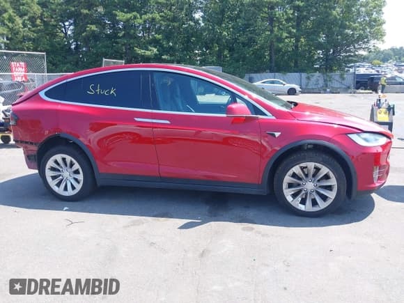 ✅ 2018 Tesla Model X 75D • VIN: 5YJXCDE27JF104964 • Lot: 42860551. Listed on IAAI with 62,176 mi. Free auction sales archive from the USA and detailed vehicle history report at DreamBid. Image 14.