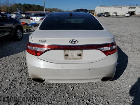 2013 Hyundai Azera z VIN KMHFH4JG7DA321468, wystawiony jako Copart lot #87069554 z przebiegiem 147 382 mil mil oraz Szkoda całkowita • Salvage title. Historia ofert i sprzedaży dostępna na DreamBid. Obrazek 6.