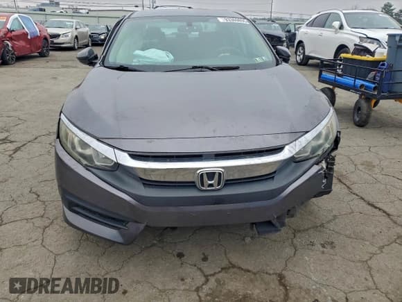 ✅ 2016 Honda Civic LX • VIN: 19XFC2F57GE220687 • Лот: 93369895. Опубликован ранее на Copart с пробегом 107 527 миль. Бесплатный доступ к архиву аукционных продаж из США и подробный отчёт об истории автомобиля на DreamBid. Изображение 5.
