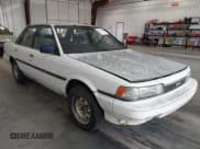 ✅ 1987 Toyota Camry LE • VIN: JT2SV22E3H3012242 • Lot: 42526925. Wystawiony na IAAI z przebiegiem 191 564 mil. Bezpłatny archiwum sprzedaży aukcyjnych z USA i szczegółowy raport historii pojazdu na DreamBid. Zdjęcie 1.