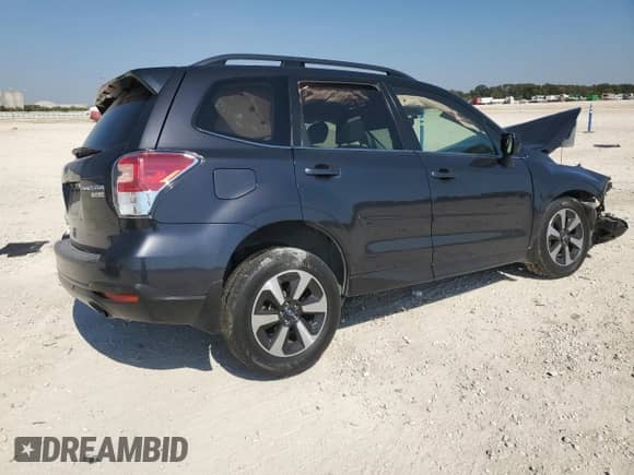 2017 Subaru Forester Limited with VIN JF2SJARC7HH419714, listed as a Copart auction lot 86193765 with 137,110 mi miles and Salvage title. Bid and sale history available at DreamBid. Image 3.