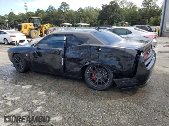 ✅ 2016 Dodge Challenger SRT Hellcat • VIN: 2C3CDZC91GH217440 • Lot: 84268575. Listed on Copart with 119,448 mi. Free auction sales archive from the USA and detailed vehicle history report at DreamBid. Image 2.