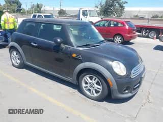 2012 MINI Hardtop with VIN WMWSU3C51CT254094, listed as a IAAI auction lot 42914433 with 157,489 mi miles and . Bid and sale history available at DreamBid. Image 1.