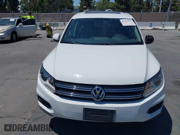 ✅ 2012 Volkswagen Tiguan SE • VIN: WVGAV7AX4CW603198 • Lot: 42581562. Listed on IAAI with 119,739 mi. Free auction sales archive from the USA and detailed vehicle history report at DreamBid. Image 6.