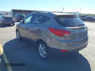 2013 Hyundai Tucson GLS with VIN KM8JUCAC5DU714171, listed as a IAAI auction lot 43432217 with 159,367 mi miles and . Bid and sale history available at DreamBid. Image 3.