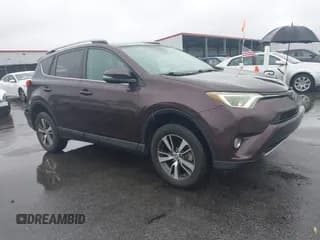 ✅ 2018 Toyota RAV4 XLE • VIN: 2T3WFREV2JW487913 • Lot: 43544505. Listed on IAAI with 104,272 mi. Free auction sales archive from the USA and detailed vehicle history report at DreamBid. Image 1.