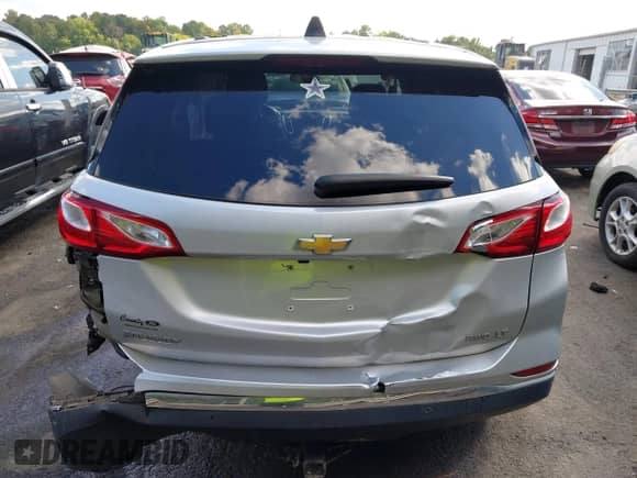 2019 Chevrolet Equinox LT with VIN 2GNAXUEV7K6274373, listed as a IAAI auction lot 43266888 with 129,076 mi miles and . Bid and sale history available at DreamBid. Image 16.