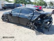 ✅ 2021 Nissan Sentra SR • VIN: 3N1AB8DV9MY302064 • Лот: 43133579. Опубликован ранее на IAAI с пробегом 34 998 миль. Бесплатный доступ к архиву аукционных продаж из США и подробный отчёт об истории автомобиля на DreamBid. Изображение 3.