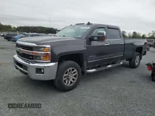 2015 Chevrolet Silverado 3500 с VIN 1GC4K0EG4FF512237, выставлен на аукционе Copart как лот 81611215 с пробегом 143 935 миль миль и Списание • Salvage title. История ставок и продаж доступна на DreamBid. Изображение 1.
