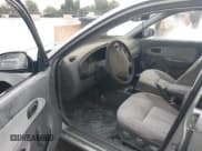 ✅ 2003 Kia Spectra • VIN: KNAFB121135297834 • Лот: 42409441. Опубликован ранее на IAAI с пробегом 84 621 миль. Бесплатный доступ к архиву аукционных продаж из США и подробный отчёт об истории автомобиля на DreamBid. Изображение 5.