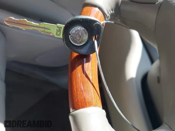 ✅ 2004 Cadillac DeVille DHS • VIN: 1G6KE54Y04U130501 • Lot: 42318769. Listed on IAAI with 81,512 mi. Free auction sales archive from the USA and detailed vehicle history report at DreamBid. Image 11.