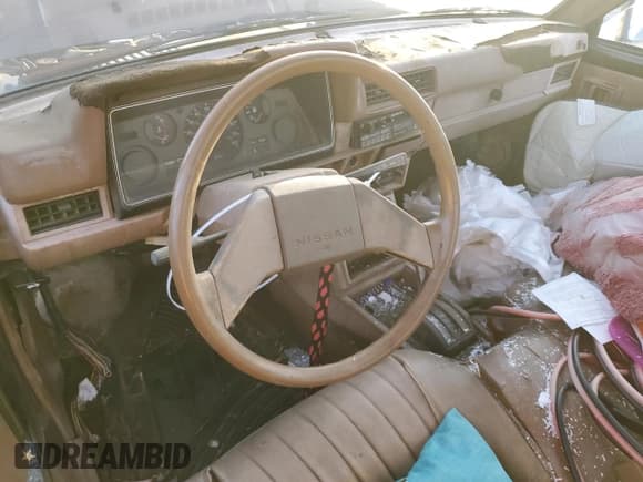 ✅ 1986 Nissan Navara • VIN: JN6ND01S0GW108990 • Lot: 87115634. Wystawiony na Copart z przebiegiem 364 953 mil. Bezpłatny archiwum sprzedaży aukcyjnych z USA i szczegółowy raport historii pojazdu na DreamBid. Zdjęcie 8.