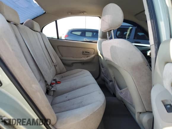 2004 Hyundai Elantra GLS z VIN KMHDN46D74U726145, wystawiony jako Copart lot #67103864 z przebiegiem 115 971 mil mil oraz Szkoda całkowita • Salvage title. Historia ofert i sprzedaży dostępna na DreamBid. Obrazek 10.