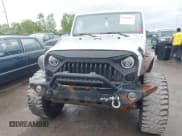✅ 2008 Jeep Wrangler Unlimited Sahara • VIN: 1J4GA59148L617989 • Lot: 43095265. Wystawiony na IAAI z przebiegiem 153 328 mil. Bezpłatny archiwum sprzedaży aukcyjnych z USA i szczegółowy raport historii pojazdu na DreamBid. Zdjęcie 12.
