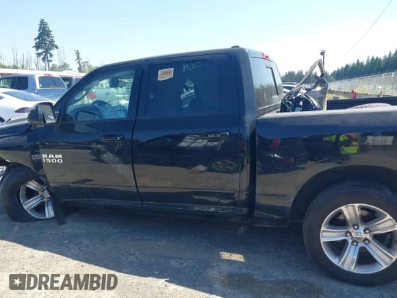 ✅ 2015 Ram 1500 Sport • VIN: 1C6RR7MT7FS601484 • Lot: 42690955. Listed on IAAI with 125,515 mi. Free auction sales archive from the USA and detailed vehicle history report at DreamBid. Image 14.