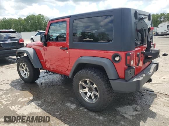 ✅ 2008 Jeep Wrangler Rubicon • VIN: 1J8GA641X8L586923 • Lot: 56243405. Listed on Copart with 93,173 mi. Free auction sales archive from the USA and detailed vehicle history report at DreamBid. Image 2.