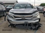 ✅ 2022 Honda Pilot Touring 7-Passenger • VIN: 5FNYF6H61NB019565 • Lot: 61307035. Listed on Copart with 75,932 mi. Free auction sales archive from the USA and detailed vehicle history report at DreamBid. Image 5.